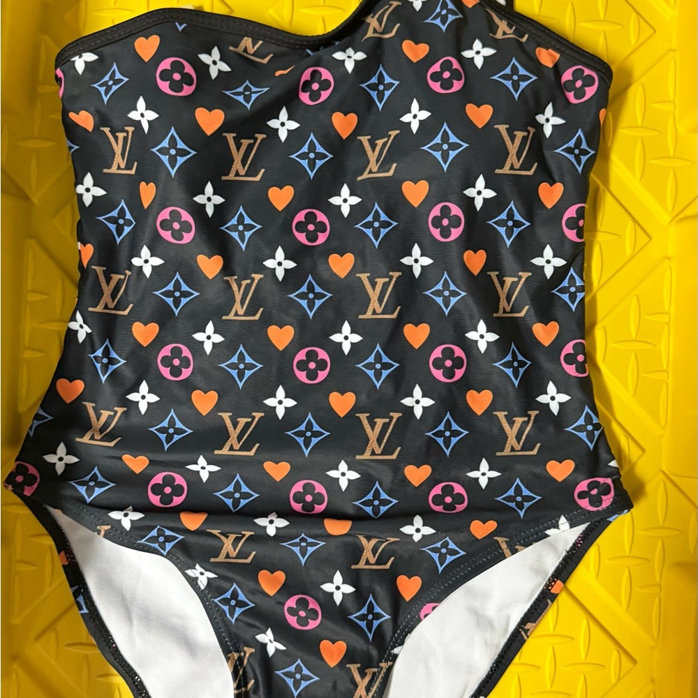 Stylish Women's One-Piece Swimsuit - Black, Orange, and Blue